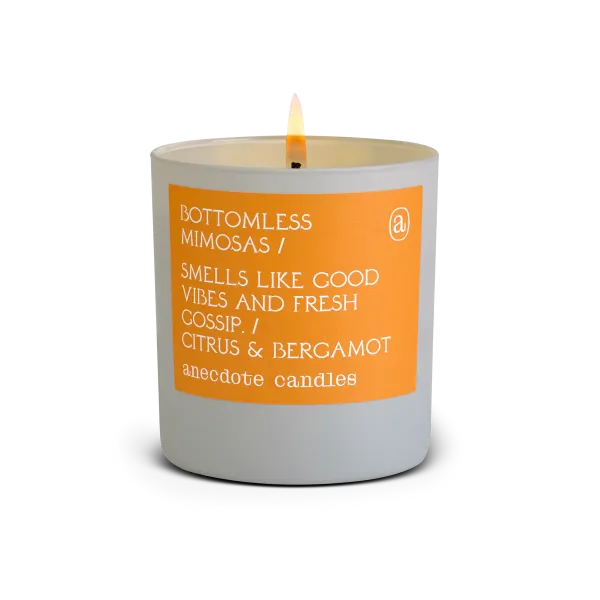 best champagne scented candles - anecdote candles bottomless mimosas - candle junkies