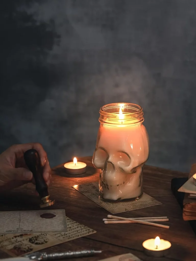 skull candle jar halloween 28 Spooky Skull Candles For Halloween + Decor Items
