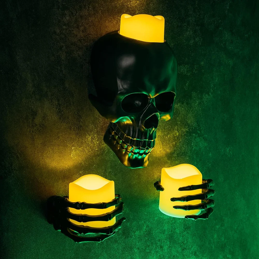skull hands wall candle